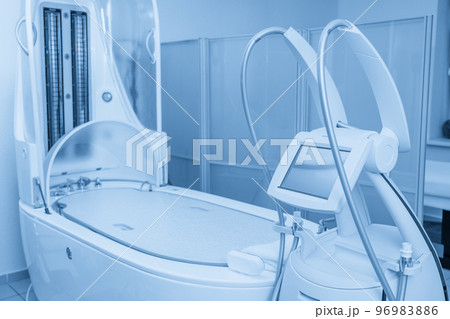Modern spa treatment capsule in cosmetology clinic Modern spa treatment capsule in cosmetology clinic 96983886