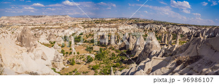 Unique geological formations in Love Valley in Cappadocia, popular travel destination in Turkey Unique geological formations in Love Valley in Cappadocia, popular travel destination in Turkey 96986107