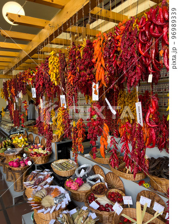 colorful red and orange peppers at the market mobile photo 96989339