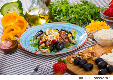 Rocket salad with ingredients 96992767