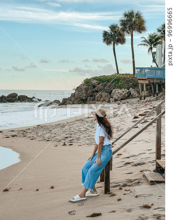 Young beautiful woman relax on the beach 96996665
