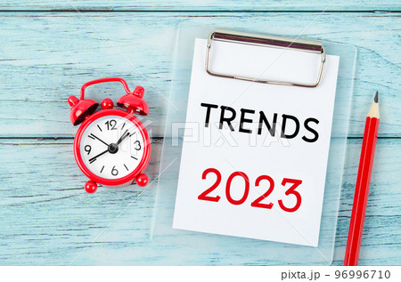 The Trends 2023 year with alarm clock. Change and determination concept. The Trends 2023 year with alarm clock. Change and determination concept. 96996710