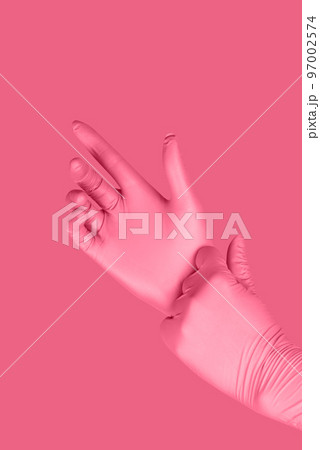 Gray gloves on a colored in trendy background Gray gloves on a colored in trendy background 97002574