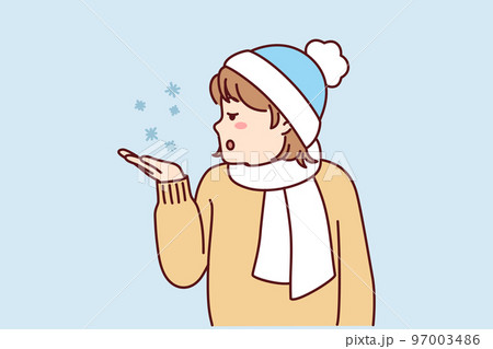 Little teen girl in winter hat and scarf stretches out palm to pick up snowflakes. Vector image 97003486
