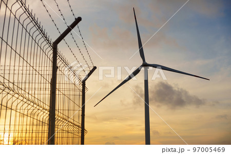 Wind turbines produce electricity, which is clean and environmentally friendly energy. Wind turbines produce electricity, which is clean and environmentally friendly energy. 97005469