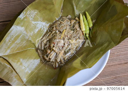 Bamboo shoots for food, Sliced and cooking bamboo shoots on banana leaf on the table food in Thailand 97005614