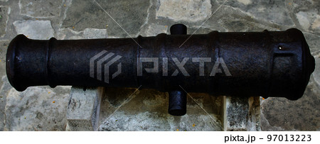 Ancient cannons of defense weapons in the old fortress 97013223