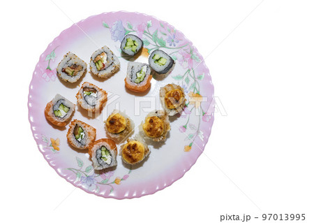 Varied set of delicious oriental sushi lounge on a porcelain ceramic pink plate 97013995
