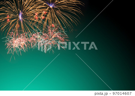 colorful fireworks display on green background 97014607