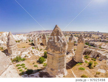 Unique geological formations in Love Valley in Cappadocia, popular travel destination in Turkey 97025498