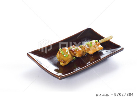 Various kind of grilling kushiyaki or meat skewers on white background. Japanese style skewered food in the izakaya restaurant. 97027884
