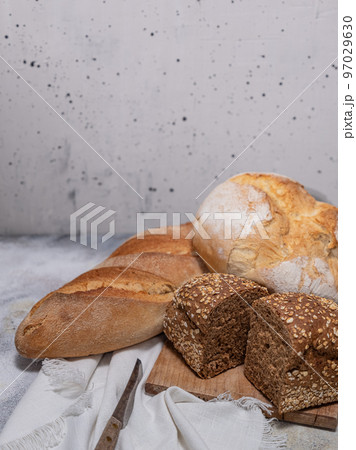 Freshly baked bread grey concrete background 97029630