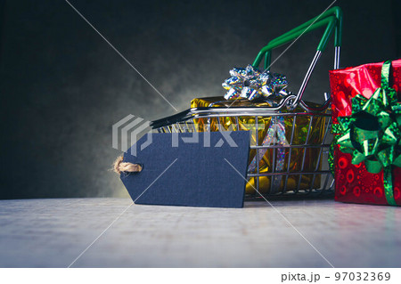 Christmas sale. Copyspace on the price tag. Buying gifts on sale. 97032369