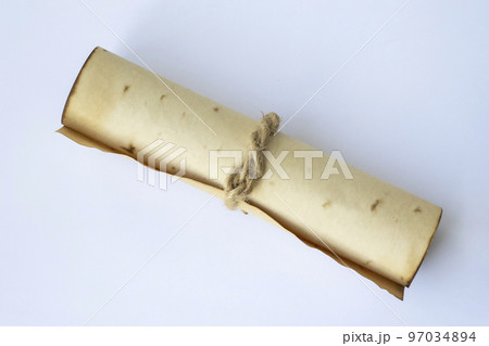 Ancient scroll. Medieval manuscript on white background 97034894