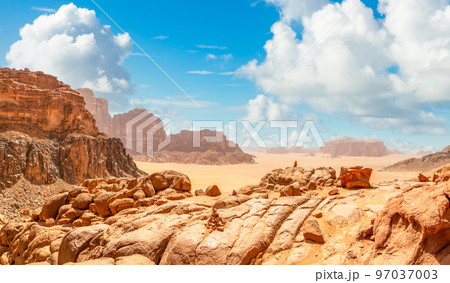 Red rocks, sands, mountains and landscape of Wadi Rum desert, Jordan Red rocks, sands, mountains and landscape of Wadi Rum desert, Jordan 97037003
