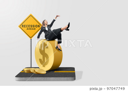 Asian businesswomen slipped while on a coin with a recession sign Asian businesswomen slipped while on a coin with a recession sign 97047749
