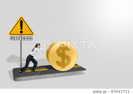 Asian businesswoman pushing coin away from recession sign Asian businesswoman pushing coin away from recession sign 97047751
