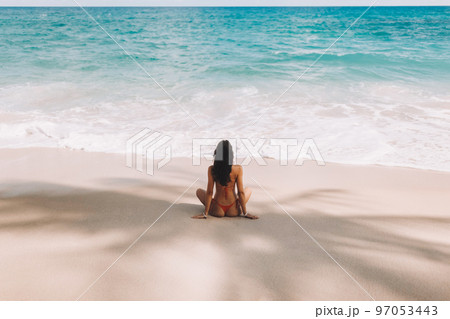 Bikini Beach Girl in Red Swimsuit on Tropical Seashore Under Palm Tree Shade During Sea Vacation 97053443