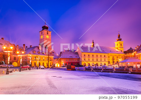 Sibiu, Romania. Winter night scenic Lesser Square, medieval city in Transylvania. 97055199