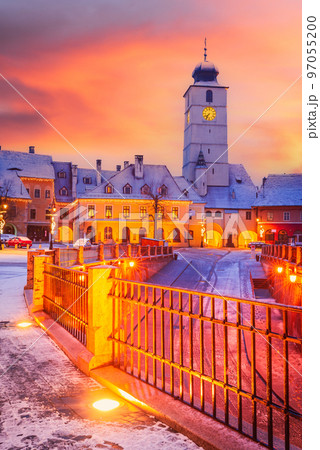 Sibiu, Romania. Winter night scenic Lesser Square, medieval city in Transylvania. 97055200