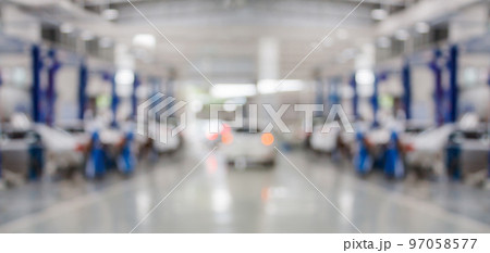 car service centre auto repair workshop blurred panoramic background 97058577