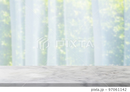 Empty marble table top with blur window curtain background Empty marble table top with blur window curtain background 97061142