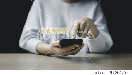 Customer review satisfaction questionnaire feedback survey concept, User give a rating to service experience on the online application, Customer can evaluate the quality of service leading to 97064252