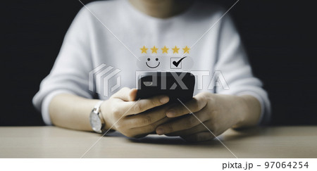 women choose five stars. Customer review satisfaction questionnaire feedback survey concept, User give a rating to service experience on the online application, Customer can evaluate the quality of 97064254