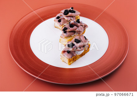 bruschetta with boiled pork and truffle sauce bruschetta with boiled pork and truffle sauce 97066671