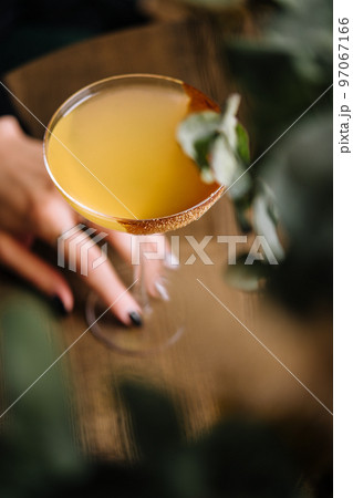 Glass of sidecar orange cocktail top view 97067166