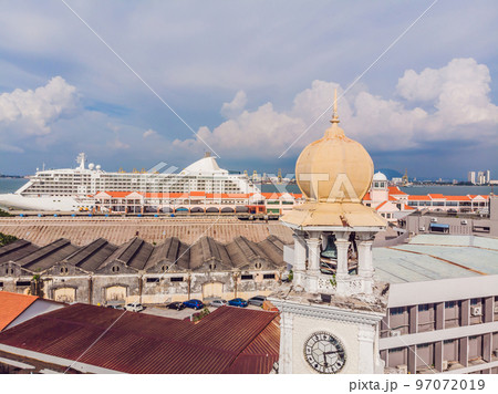 Young woman feeding an African Sacred ibis 97072019