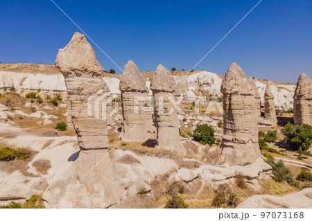 Unique geological formations in Love Valley in Cappadocia, popular travel destination in Turkey 97073168