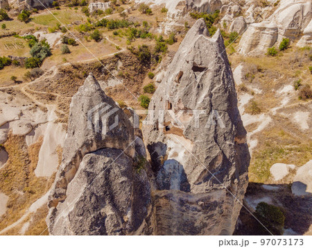 Unique geological formations in Love Valley in Cappadocia, popular travel destination in Turkey Unique geological formations in Love Valley in Cappadocia, popular travel destination in Turkey 97073173
