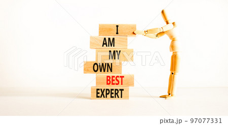I am my own best expert symbol. Concept words I am my own best expert on wooden blocks on a beautiful white table white background. Businessman icon. Business i am my own best expert concept. 97077331