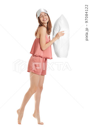 Woman with feather showing smooth skin after bikini epilation on pink background 97084122