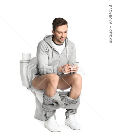 Woman with feather showing smooth skin after bikini epilation on pink background 97084153