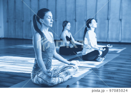 Tibetan singing bowls in sound therapy in spa center 97085024