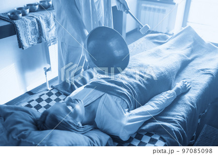 Tibetan singing bowls in sound therapy in spa center 97085098