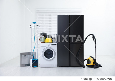 Refrigerator and different household appliances in room 97085790