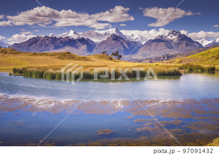 Wilcacocha lake reflection in Cordillera Blanca, snowcapped Andes, Ancash, Peru Wilcacocha lake reflection in Cordillera Blanca, snowcapped Andes, Ancash, Peru 97091432