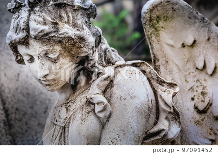 Young sad and beautiful fragile Angel, Recoleta cemetery, Buenos Aires Young sad and beautiful fragile Angel, Recoleta cemetery, Buenos Aires 97091452