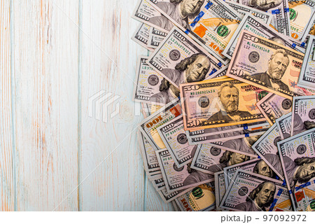 American dollars as a background. Finance and banks. The growth of the dollar. 97092972