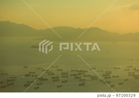 Sea port at scenic sunset in West Kowloon, Hong Kong 2 July 2012 Sea port at scenic sunset in West Kowloon, Hong Kong 2 July 2012 97100329