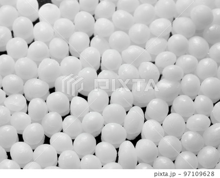 Extreme close up picture of polyamide granules, selective focus. Extreme close up picture of polyamide granules, selective focus. 97109628