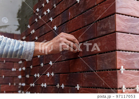 installation of facing facade tiles 97117053