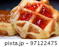 Close up fresh waffles with above strawberry jam 97122475