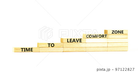 Leave comfort zone symbol. Concept words Time to leave comfort zone on wooden blocks. Beautiful white table white background. Business time to leave comfort zone concept. Copy space. 97122827