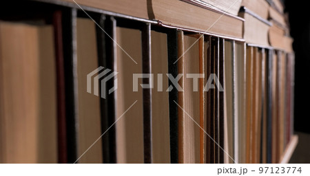 Many books organized in shelves in a big bookstore Many books organized in shelves in a big bookstore 97123774