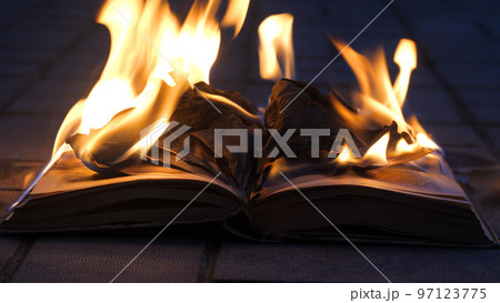 An open book is on fire An open book is on fire 97123775