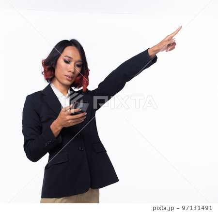 Half body Tanned skin Asian Indian woman points finger hand up to Sky, Business Blazer female has confident smart hold smart phone to future empty area air, studio white background isolated 97131491
